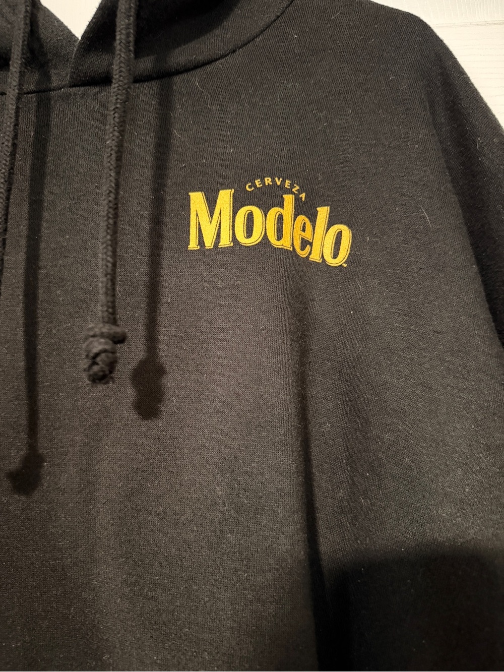 Modelo Black Hoodie with Yellow Logo